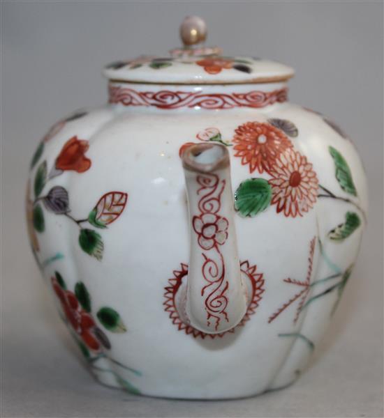 A rare Arita quatre-lobed small teapot and cover, late 17th century, 8.2cm, firing crack to body